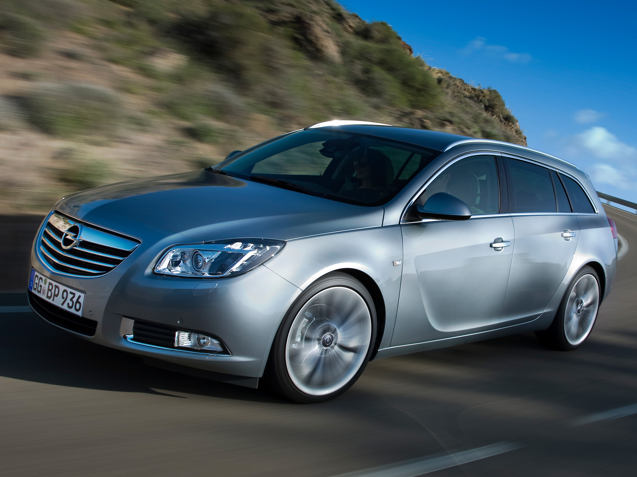 Opel insignia tourer. Опель Инсигния 2.0 универсал. Опель Инсигния 2008 универсал. Opel Insignia 2012 универсал. Опель Инсигния универсал 2011.